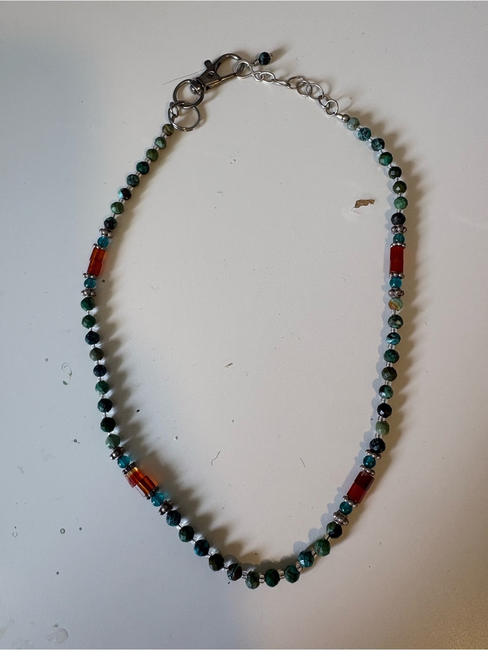 Handcrafted Green Beaded Necklace with Red Accent Beads